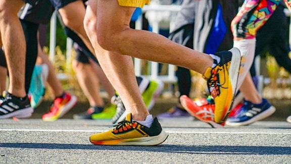 Beine von Marathonläufern